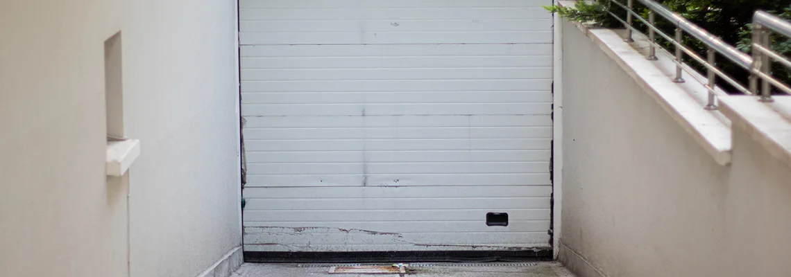 Overhead Bent Garage Door Repair in West Palm Beach, Florida