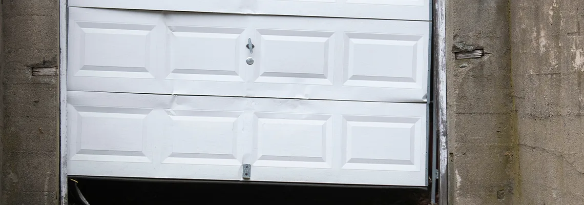 Garage Door Got Hit By A Car Dent Removal in West Palm Beach, FL