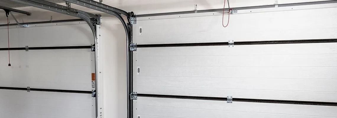 Fix Folding Garage Door Jerking in West Palm Beach, Florida