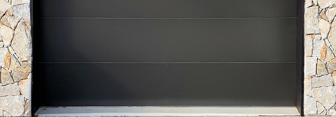 Overhead Black Garage Door Installation in West Palm Beach, Florida