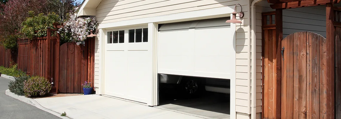 Fix Metal Garage Door Jerking in West Palm Beach, Florida